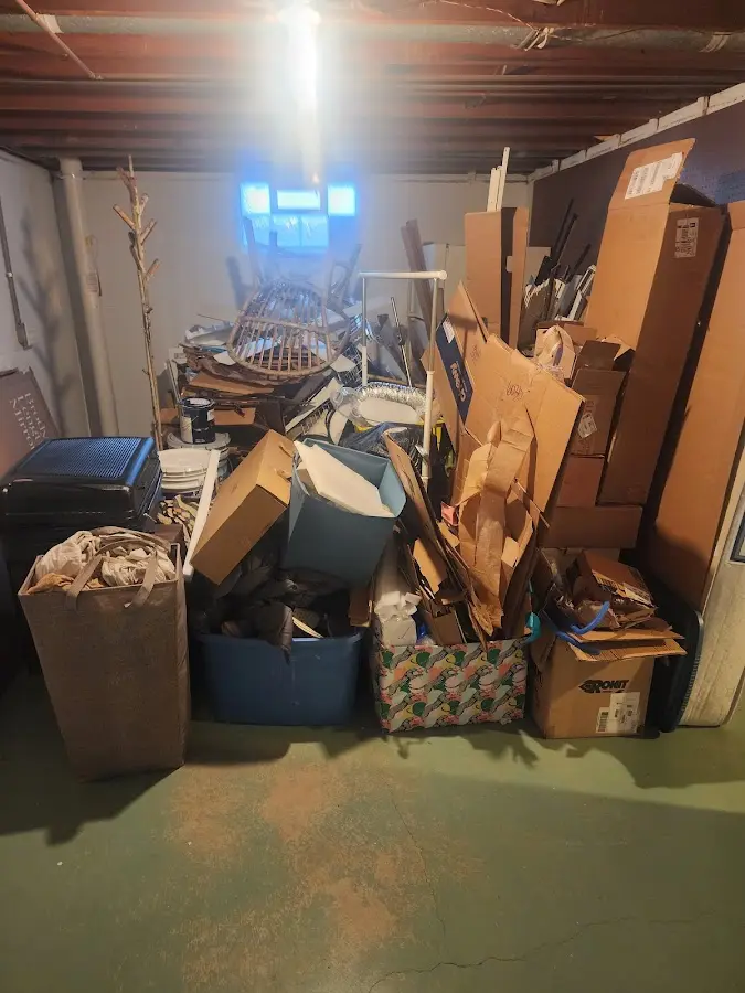 Roll-off dumpster container at job site for Cleanout Dumpster Rental in North Liberty